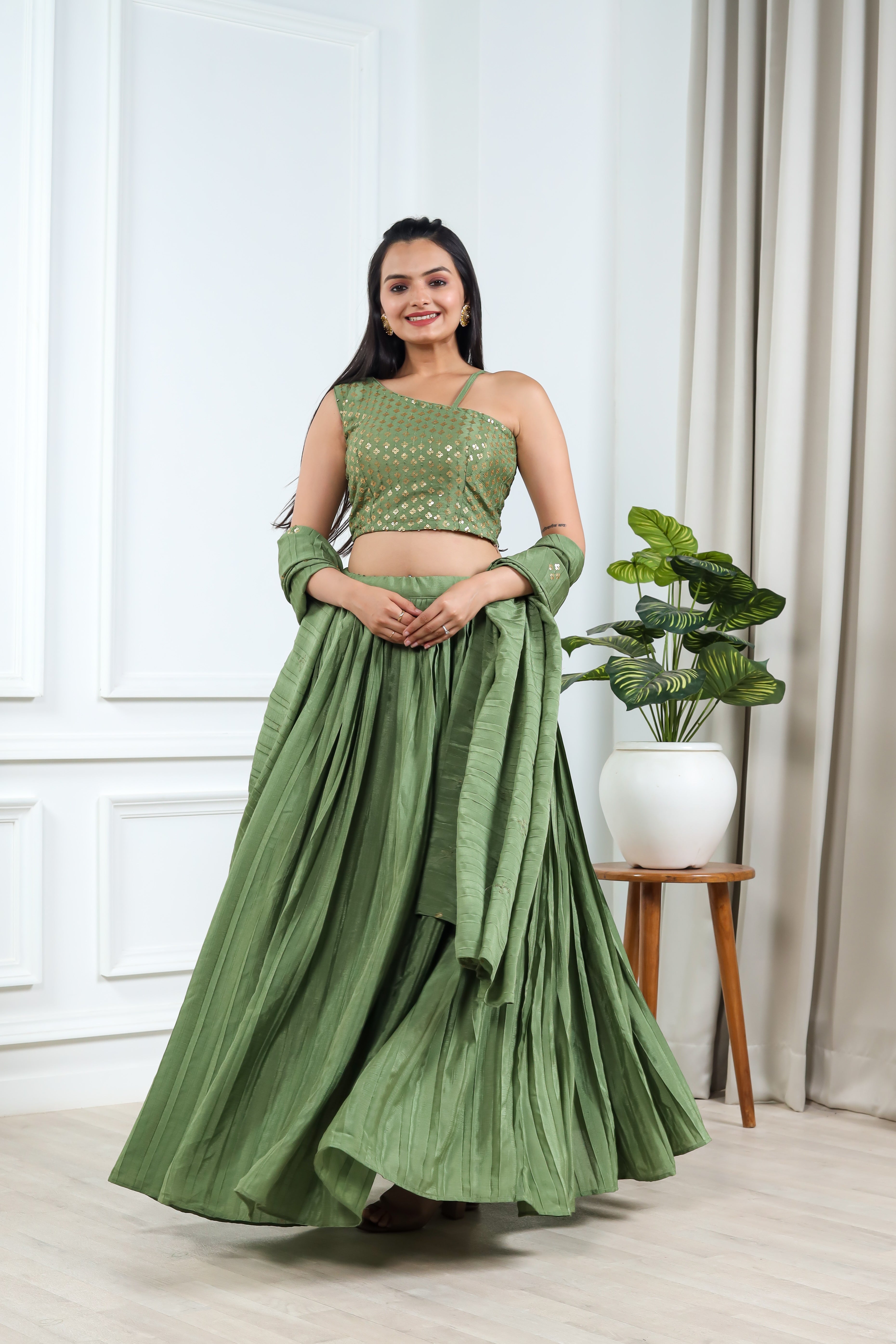 GREEN SEQUINS EMBROIDERED GEORGETTE LEHENGA CHOLI