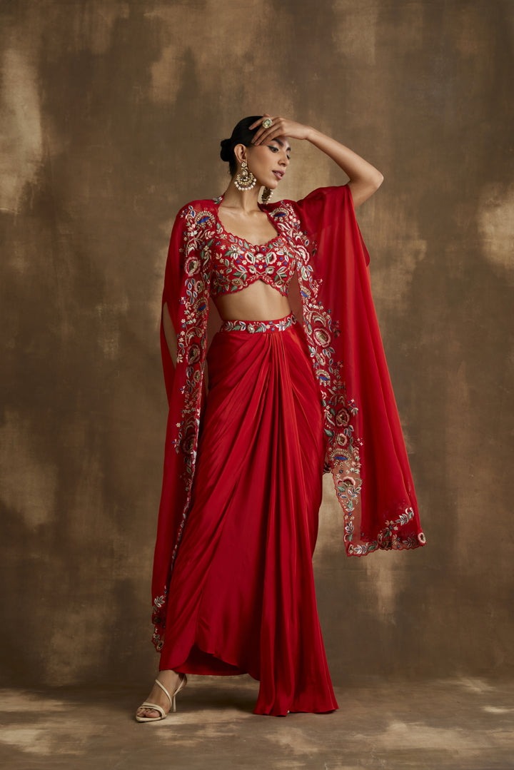 Red draped skirt with embroidered crop top & cape